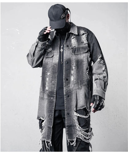 VOIDWEAR VDR_SIGNAL_07 Ritual Jacket — distressed long denim coat with ripped holes, glyph detailing, and loose high-street fit.