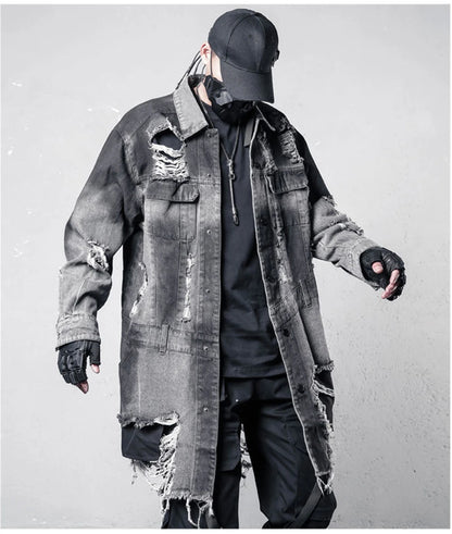 VOIDWEAR VDR_SIGNAL_07 Ritual Jacket — distressed long denim coat with ripped holes, glyph detailing, and loose high-street fit.