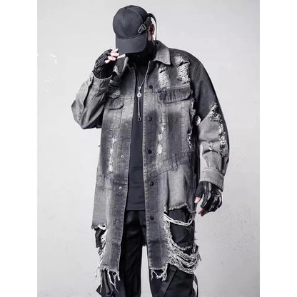 VOIDWEAR VDR_SIGNAL_07 Ritual Jacket — distressed long denim coat with ripped holes, glyph detailing, and loose high-street fit.