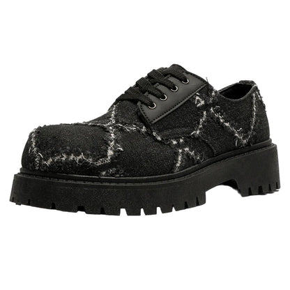 VOIDWEAR SIGNAL_CANVAS_09 ☰ men’s breathable split leather casual shoes in black, slip-on lace hybrid with rubber sole, minimalist ritual-inspired design.. Black textured shoe with thick sole on a white background