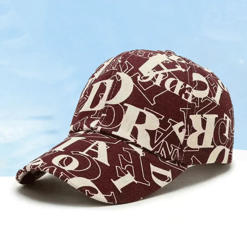 SIGNAL_VANISH_06 Cap | VOIDWEAR Ritual-Inspired Streetwear. Maroon cap with white letter pattern on a light blue background