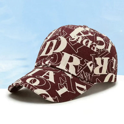 SIGNAL_VANISH_06 Cap | VOIDWEAR Ritual-Inspired Streetwear. Maroon cap with white letter pattern on a light blue background