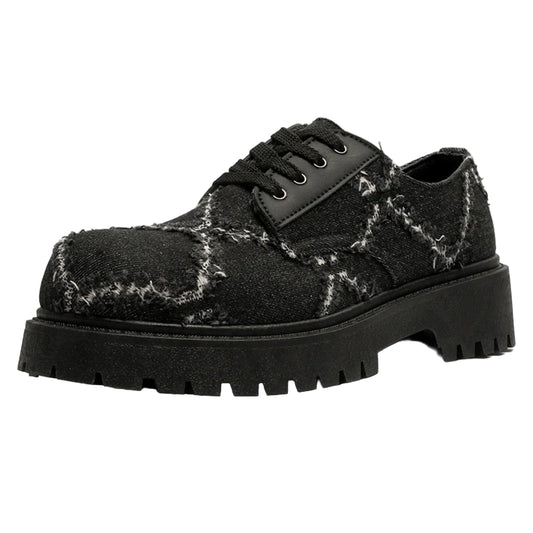 VOIDWEAR SIGNAL_CANVAS_09 ☰ men’s breathable split leather casual shoes in black, slip-on lace hybrid with rubber sole, minimalist ritual-inspired design.. Black textured shoe with thick sole on a white background